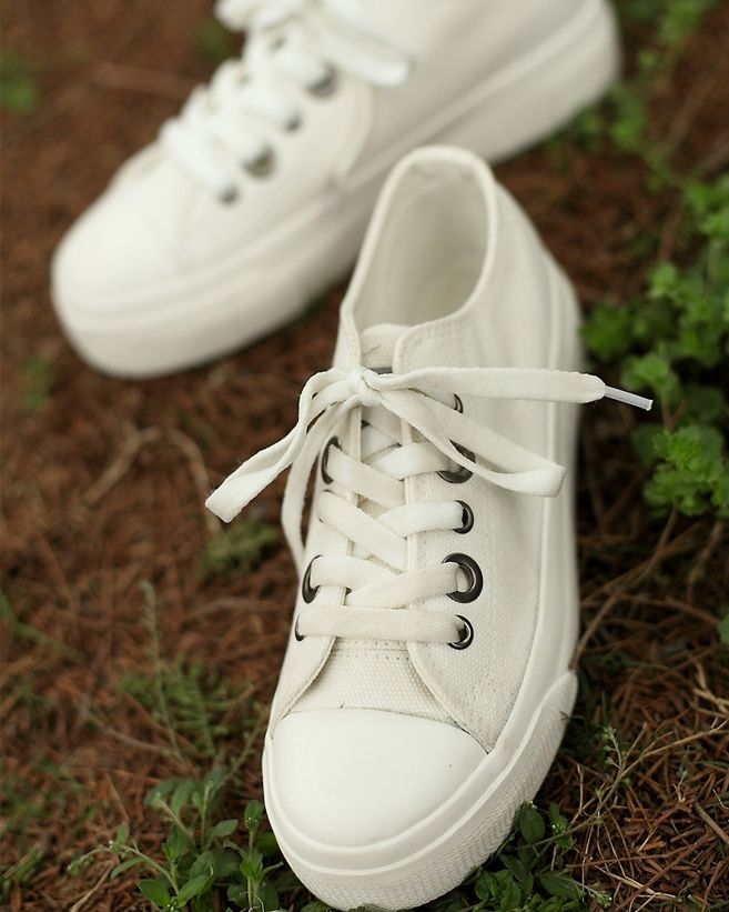 flat black and white shoes